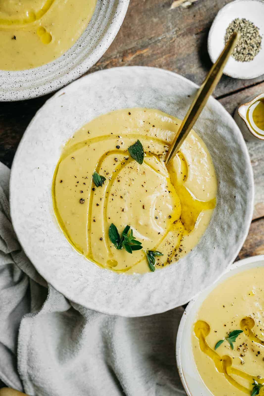 Great tasting and super nutritious potato leek soup recipe served in decorative bowls 