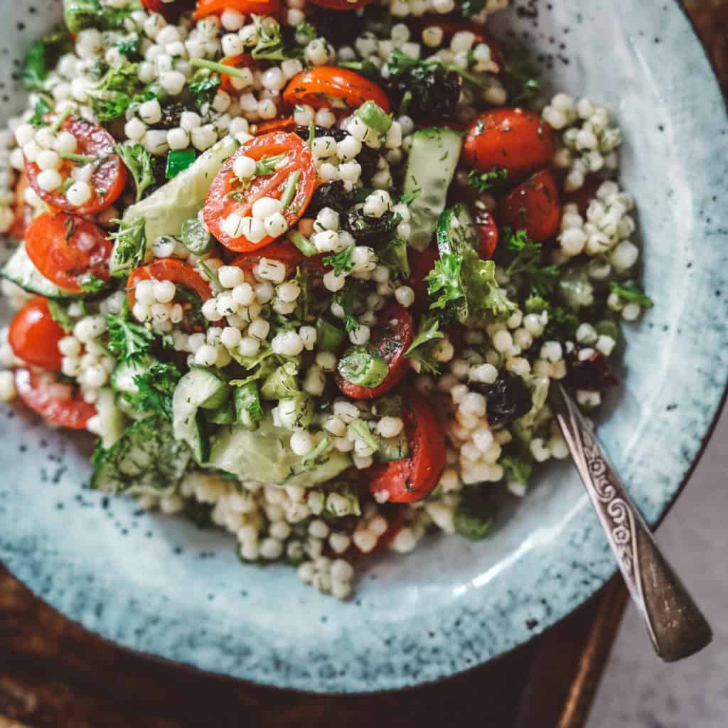 Close up of tabbouleh and couscous salad