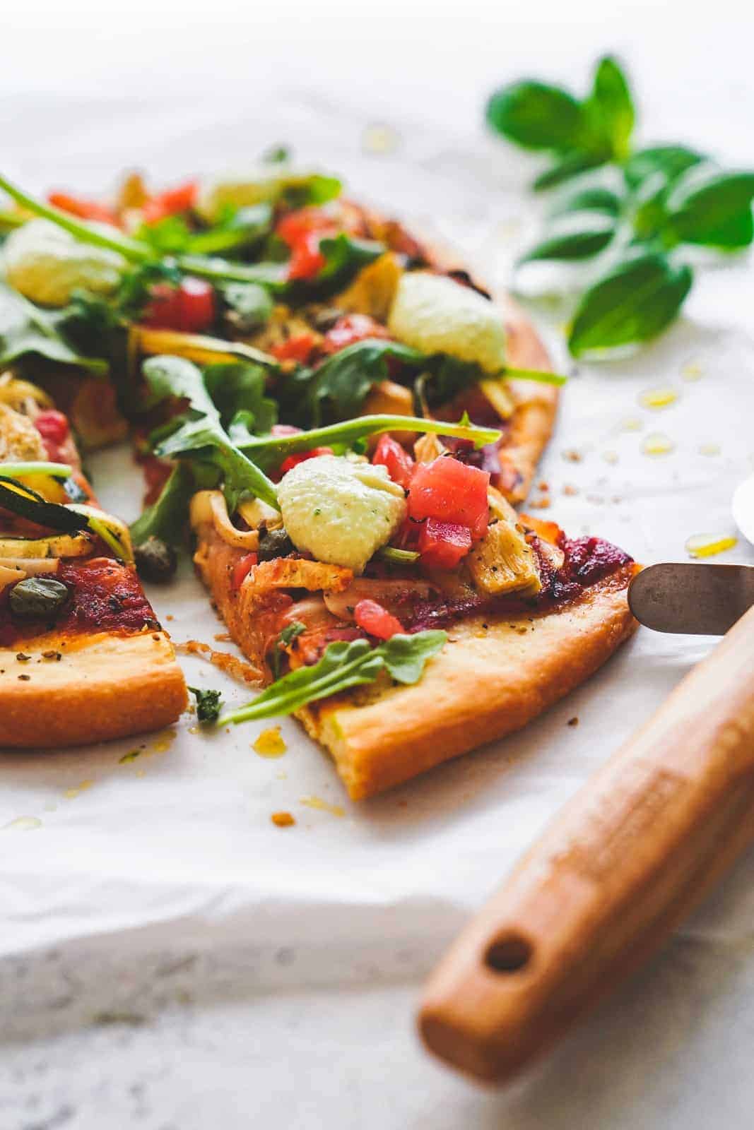 Plant-based pizza on a cutting board 