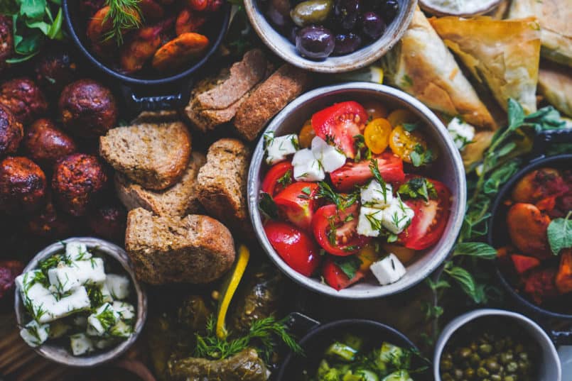 This plant based Greek platter drizzled with Ancient Foods olive oil will please all of your guests. I've included three vegan recipes in this post.