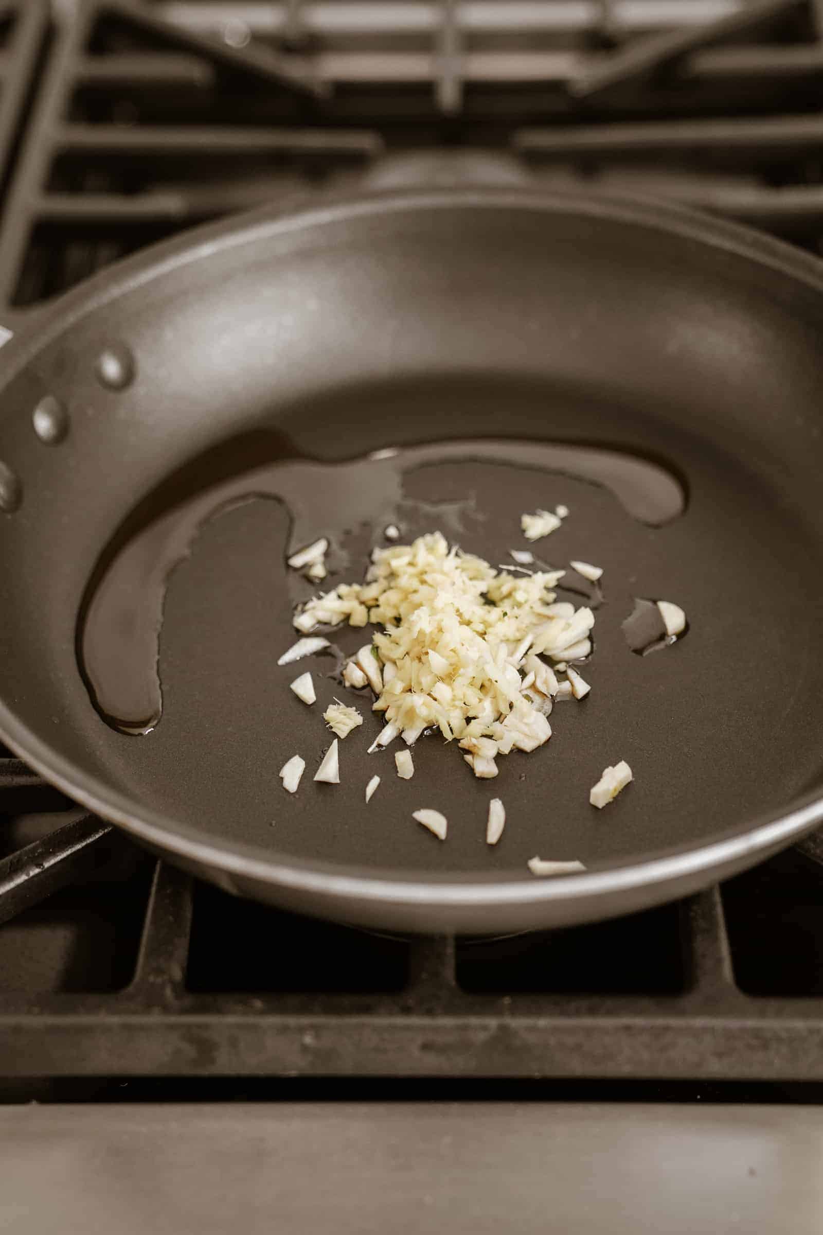 Ingredients for potstickers in a pan on the stove