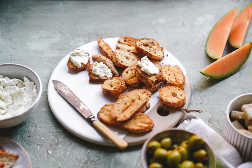 This vegan garlic herb cream cheese is so smooth and rich, it is perfect for spreading over the Silver Hills Organic Everything Bagels.