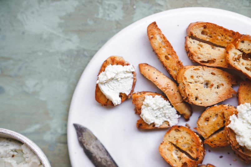 This vegan garlic herb cream cheese is so smooth and rich, it is perfect for spreading over the Silver Hills Organic Everything Bagels.