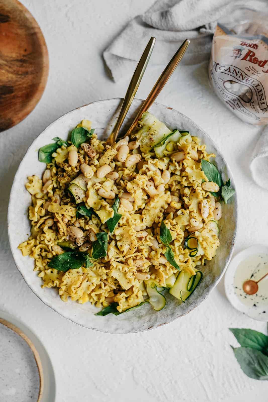 Vegan pesto pasta in a white bowl 