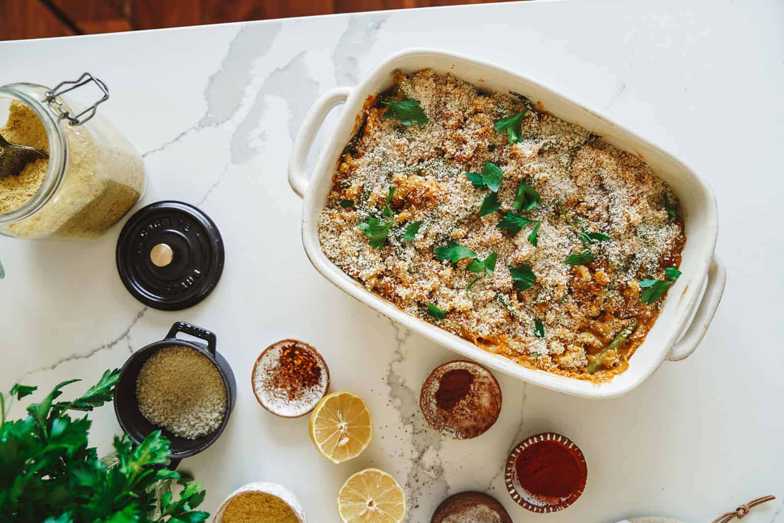 Creamy vegan tuna casserole in serving dish on countertop.