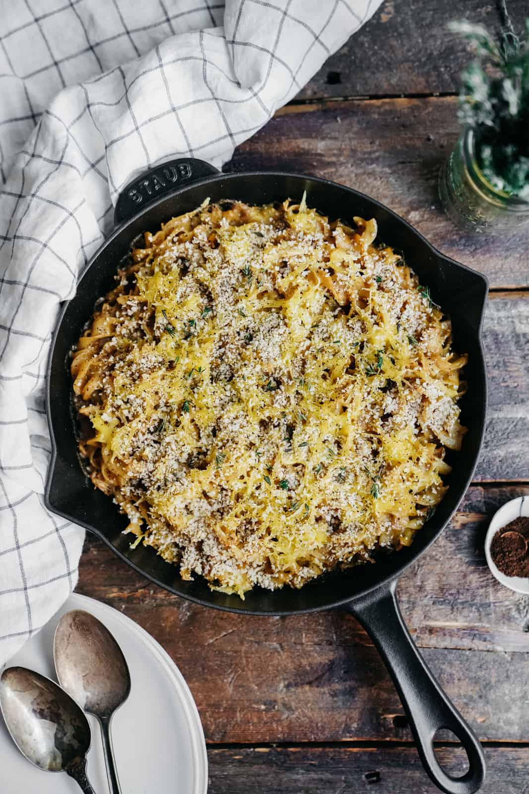 One of the 31 recipes to make in October, this Truffle Vanilla Vegan Mac & Cheese in a serving pan on the wood counter.