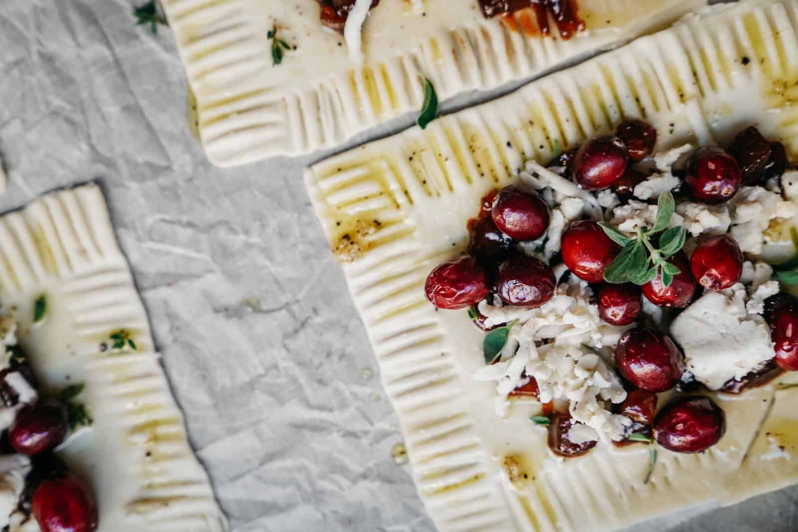 Close-up of vegan cranberry cheese tarts prior to being cooked.