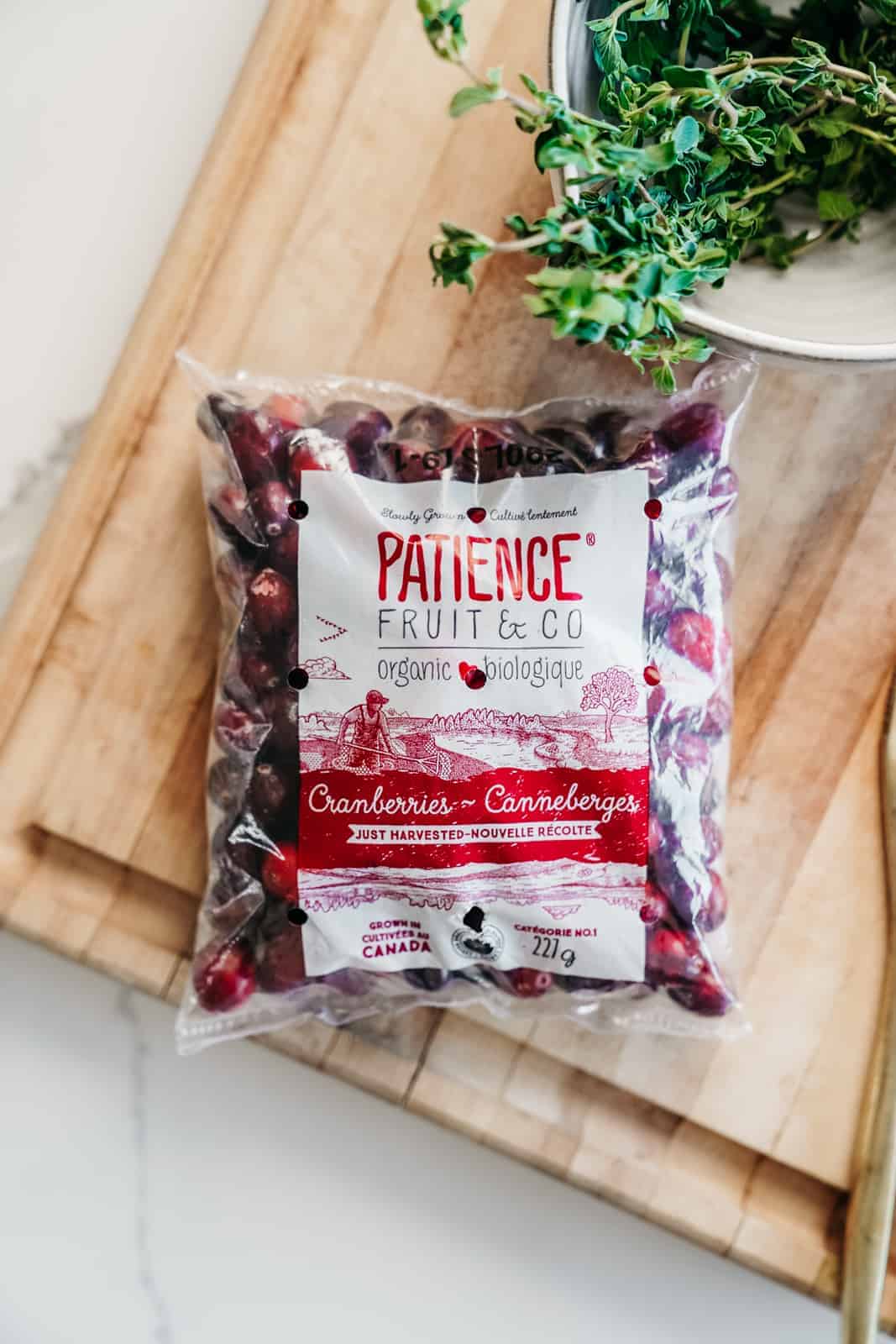 Patience Fruit & Co. Cranberries on cutting board