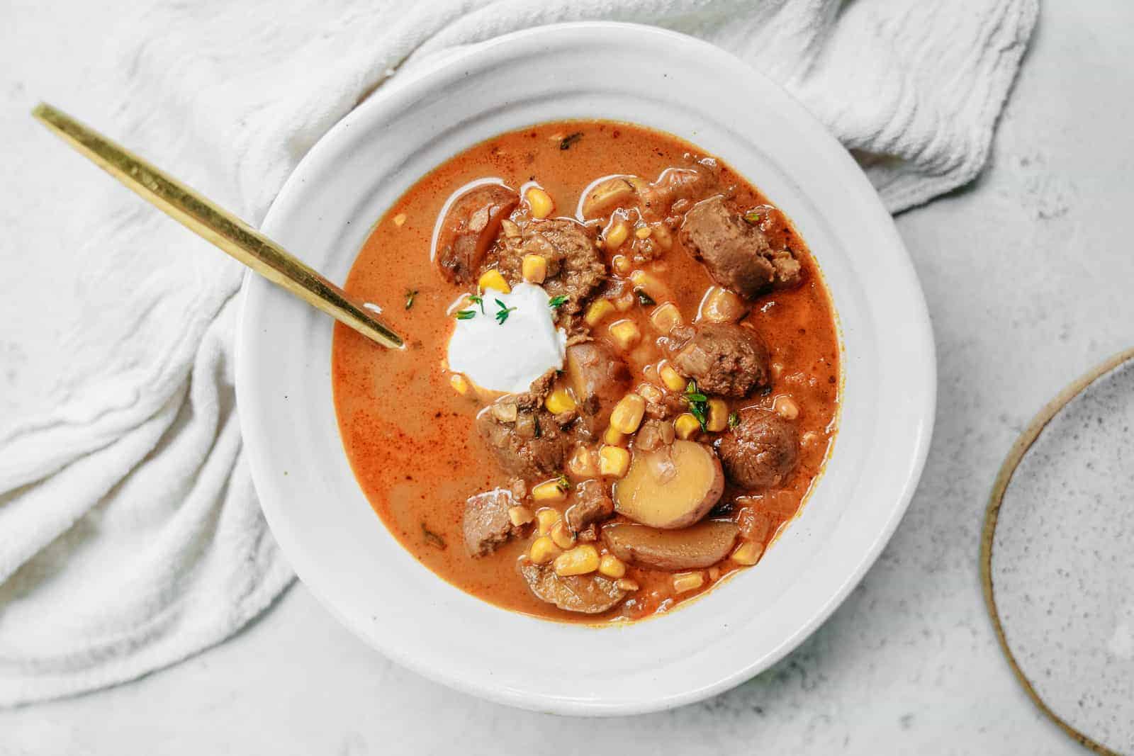 Bowl of Vegan Corn Chowder on countertop