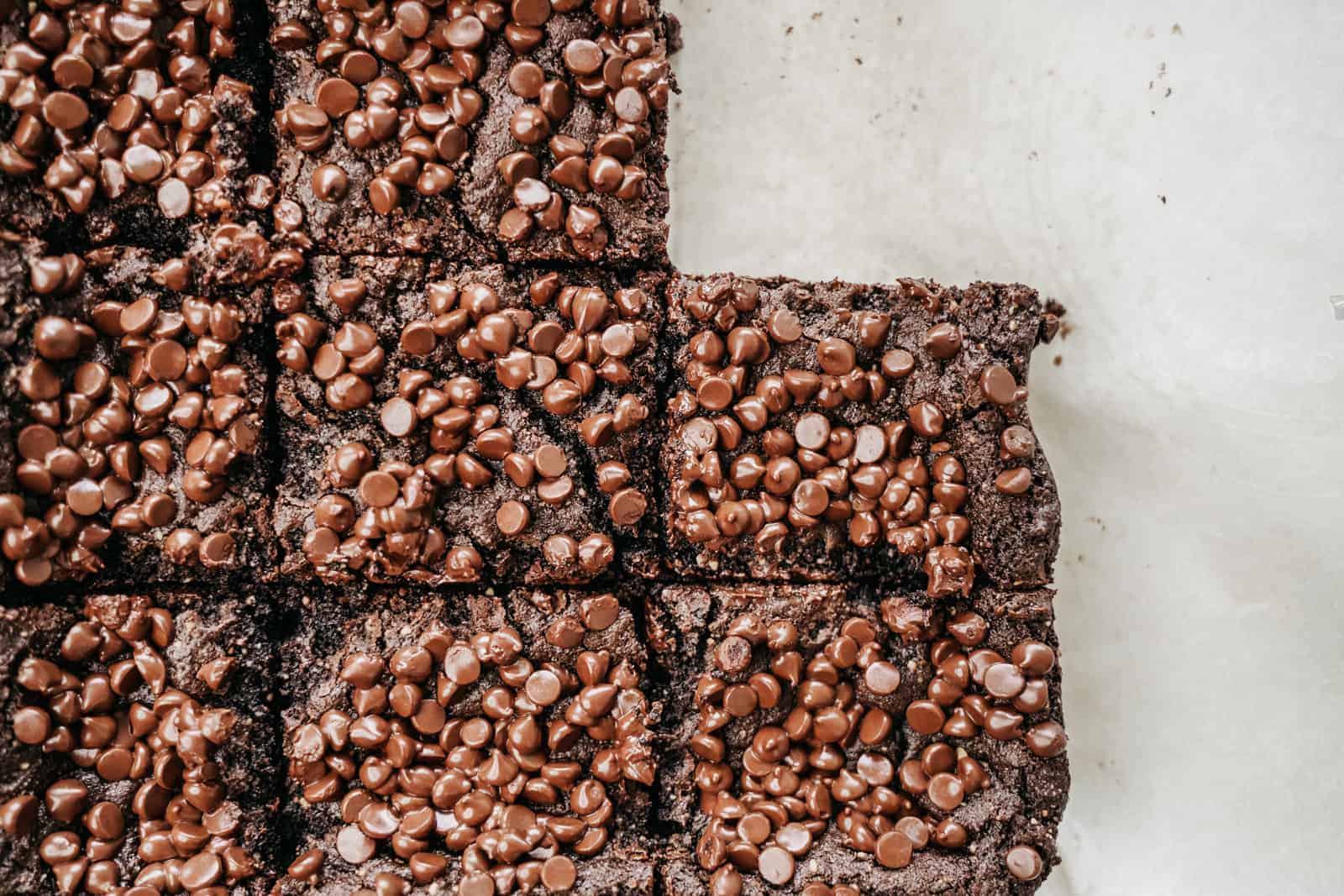 A batch of Almond Flour Brownies all cooked and ready to enjoy. Cut into squares.