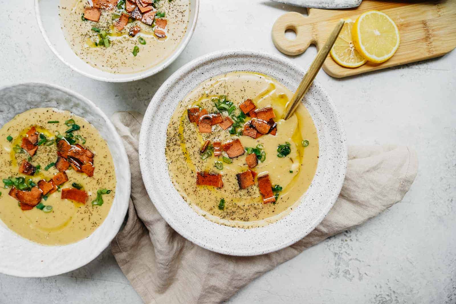 Bowls of Vegan Potato Soup ready to be devoured.