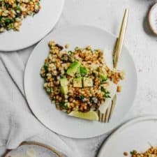 The best vegan salad on a plate with a fork