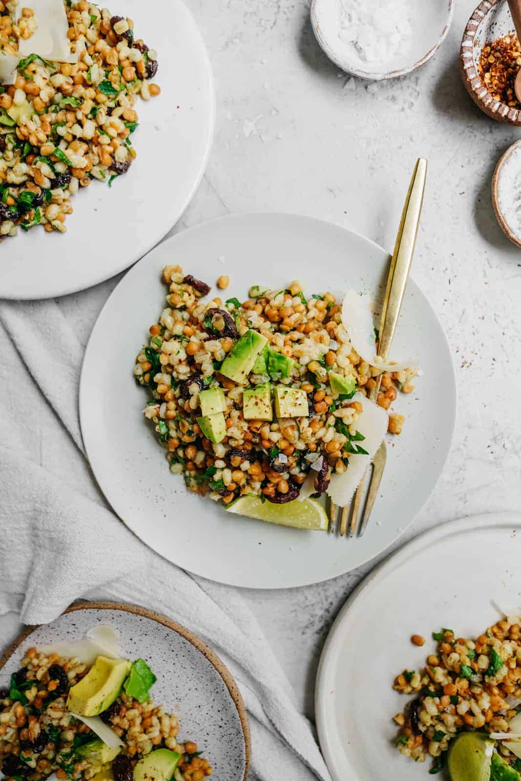 The best vegan salad on a plate with a fork