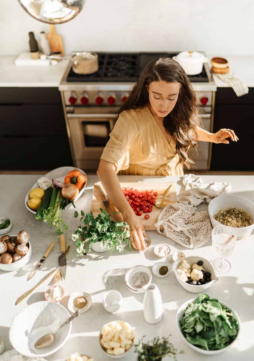 Maria propping dishes on a countertop to demonstrate her food photography tips