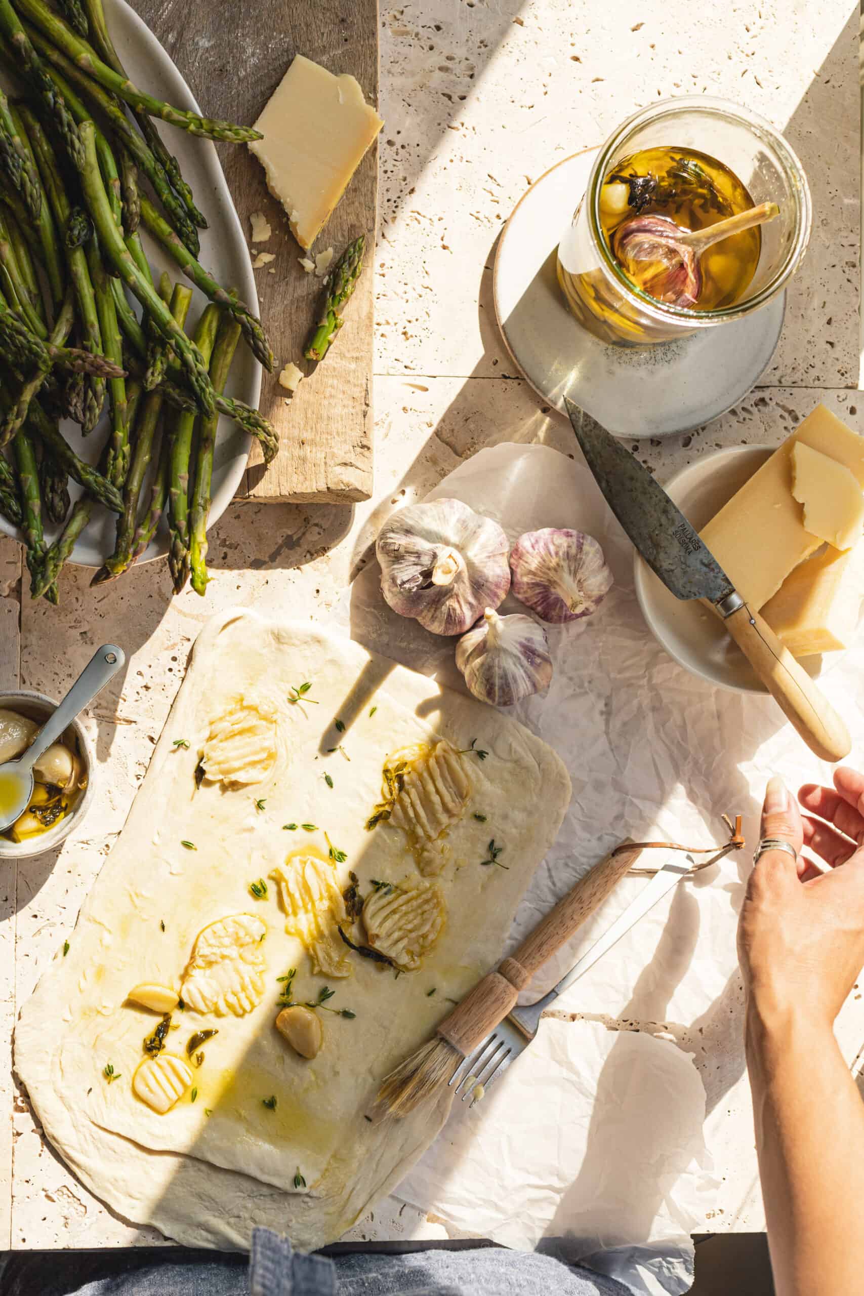 Layering on the ingredients for the Asparagus and Cheese Tart.