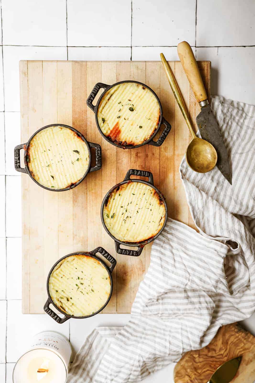 Overhead shot of Lentil Shepherd's Pie on cutting board on counter