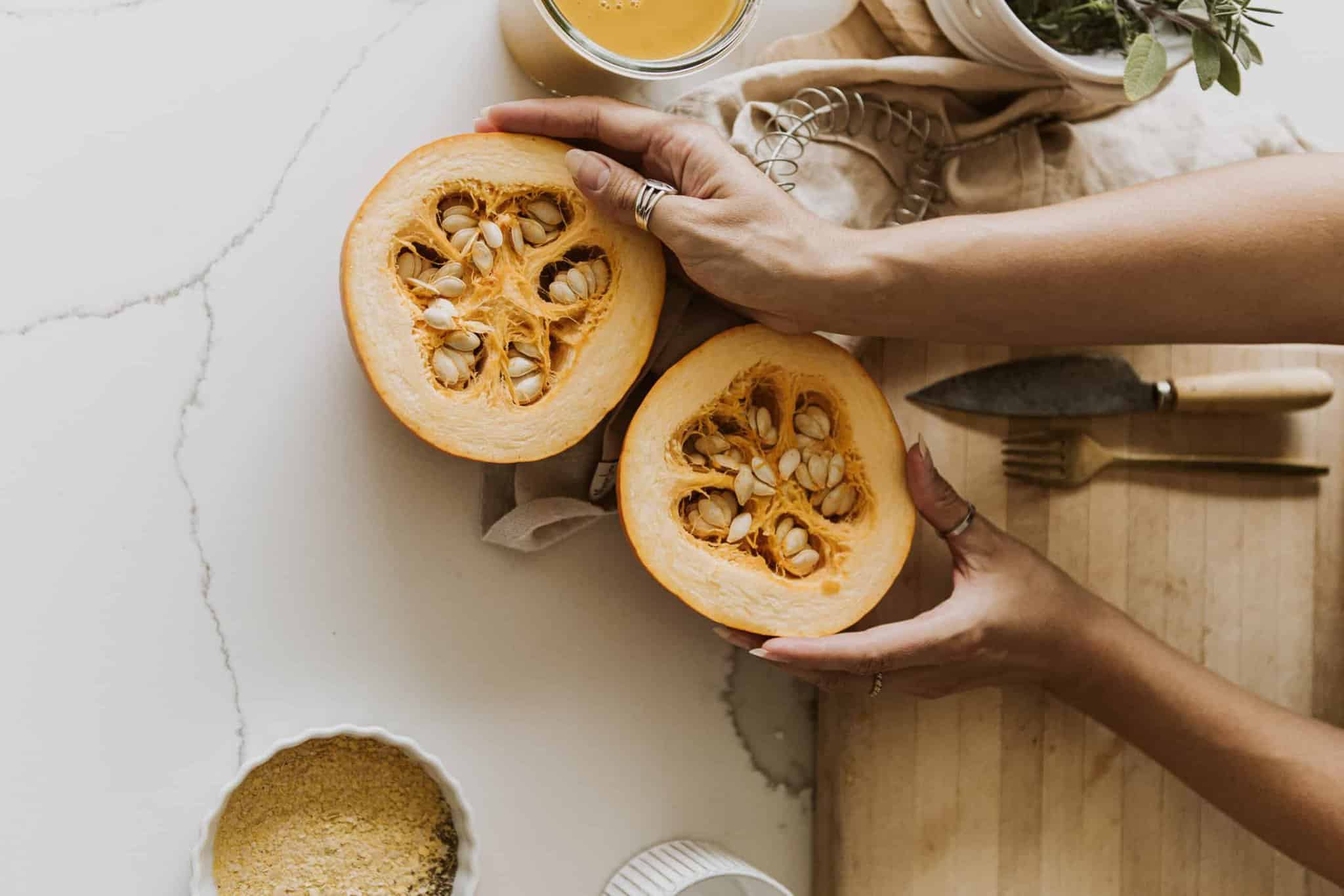 A sliced in half pumpkin for Vegan Pumpkin Mac and Cheese