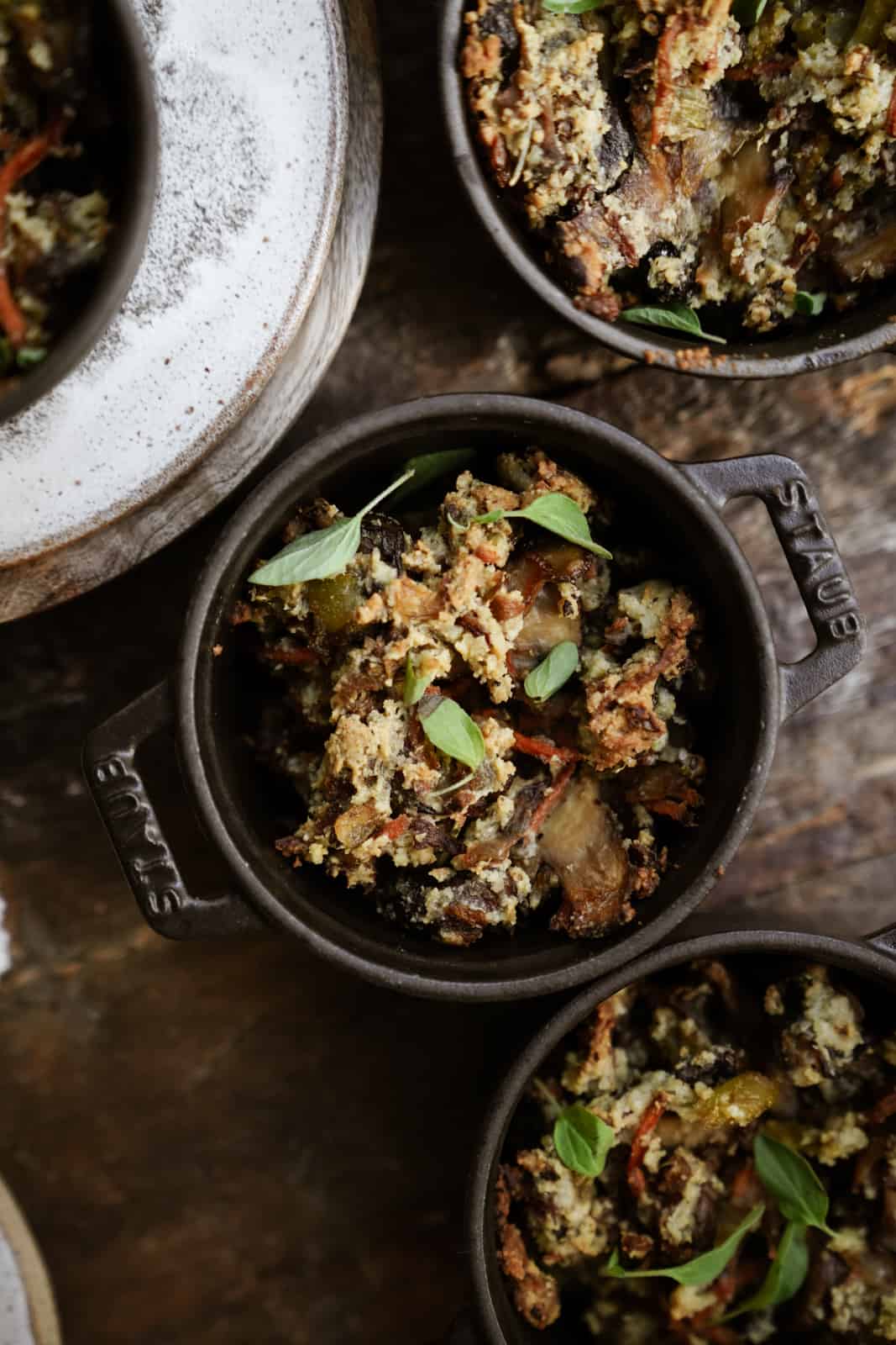 gluten-free stuffing in mini pots on counter.