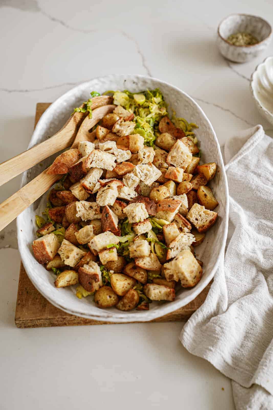 Brussel sprout caesar salad in serving bowl