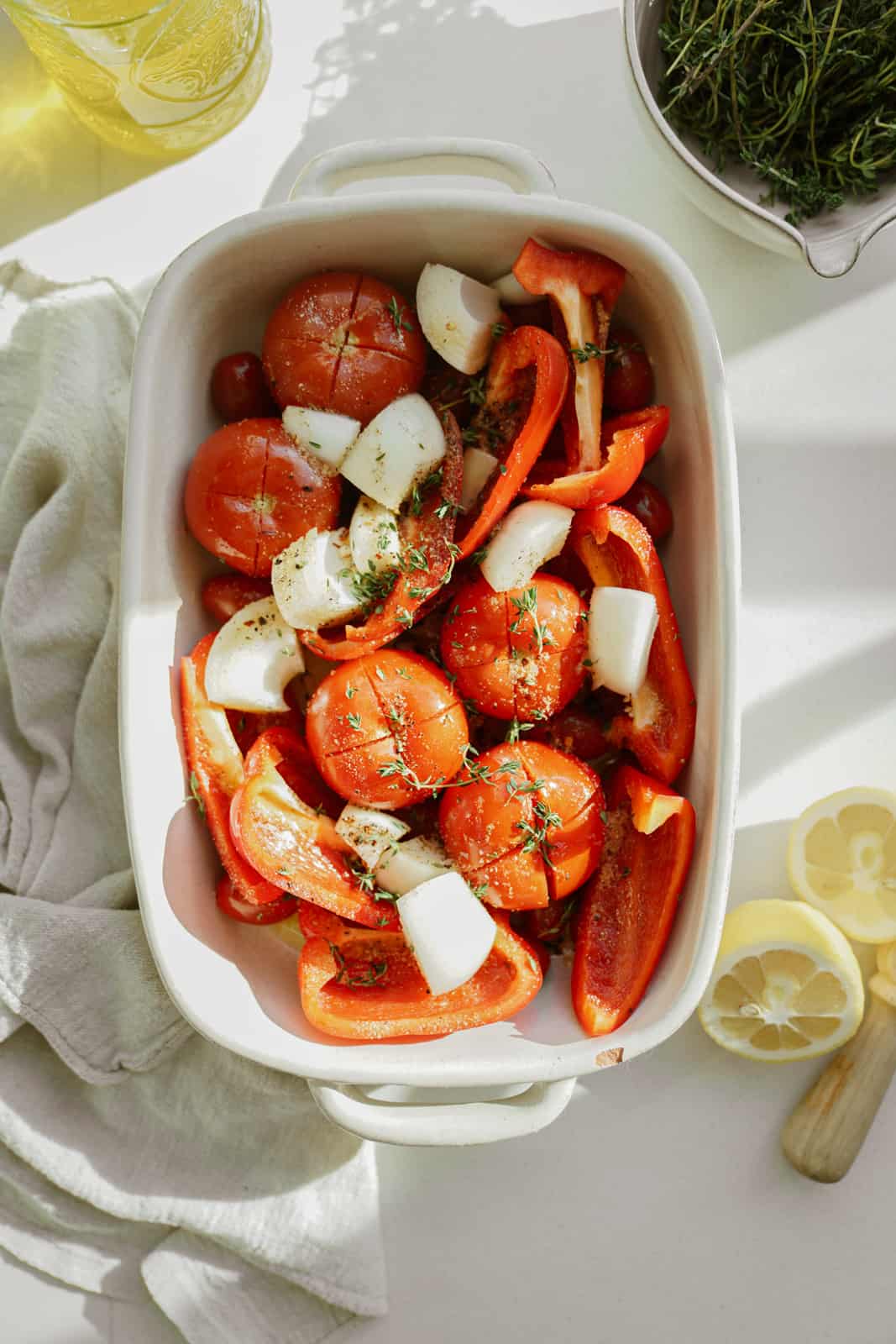 Vegetables for roasted red pepper soup in casserole dish