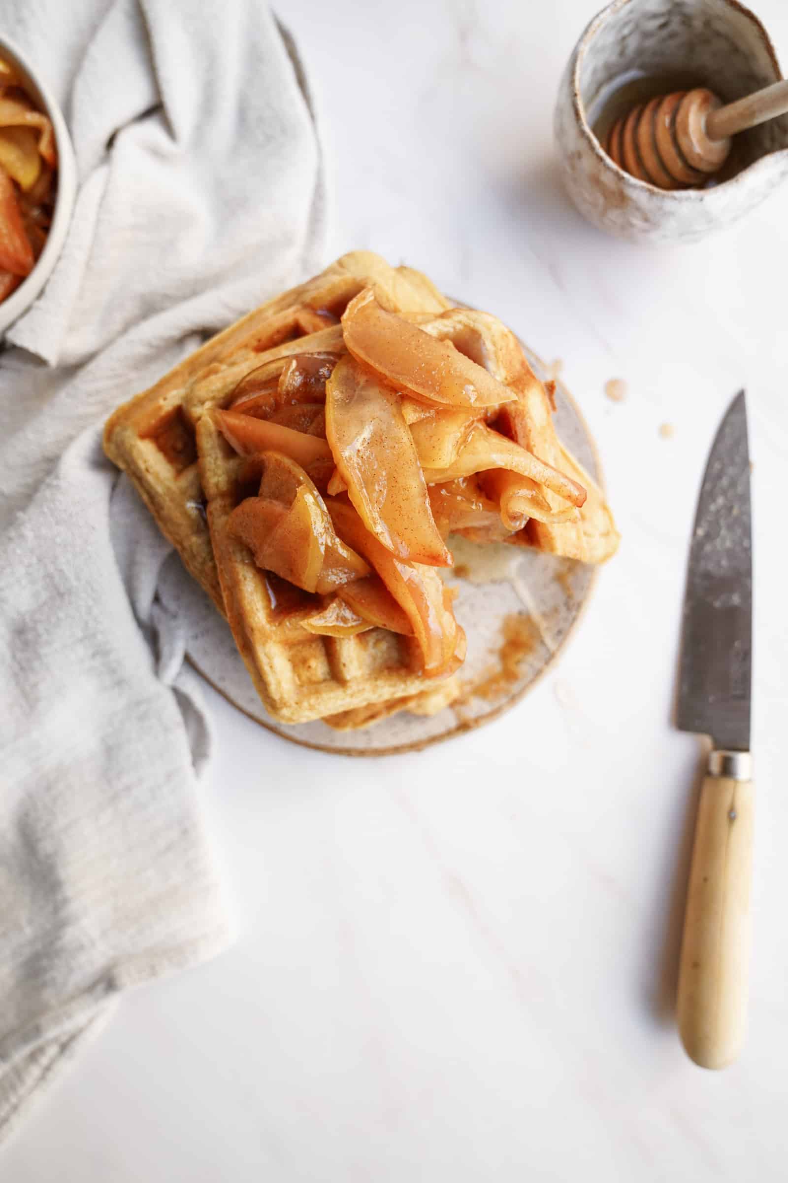 Apple Cinnamon Waffles stacked on a plate