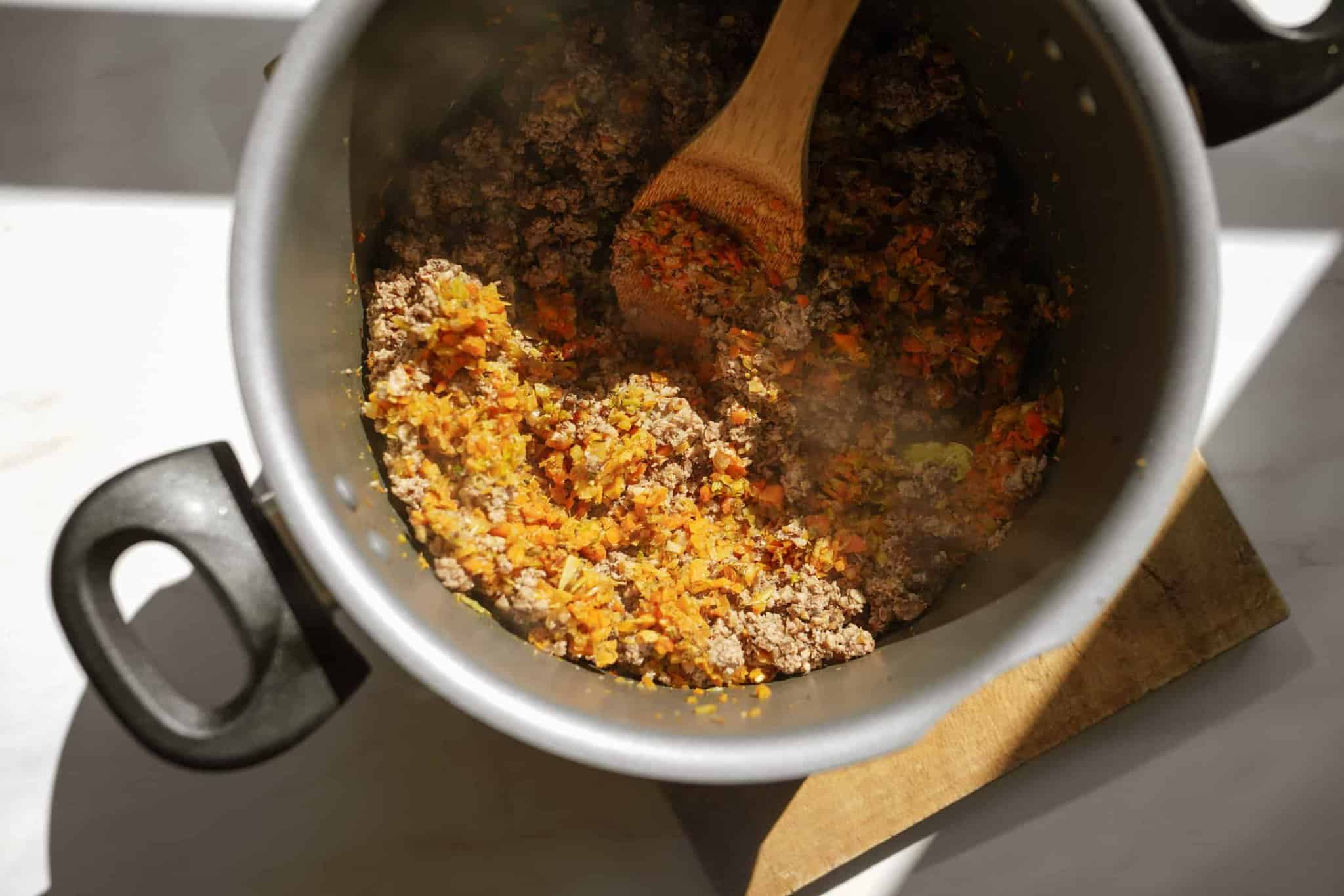 Ingredients in pot for vegan spaghetti meat sauce