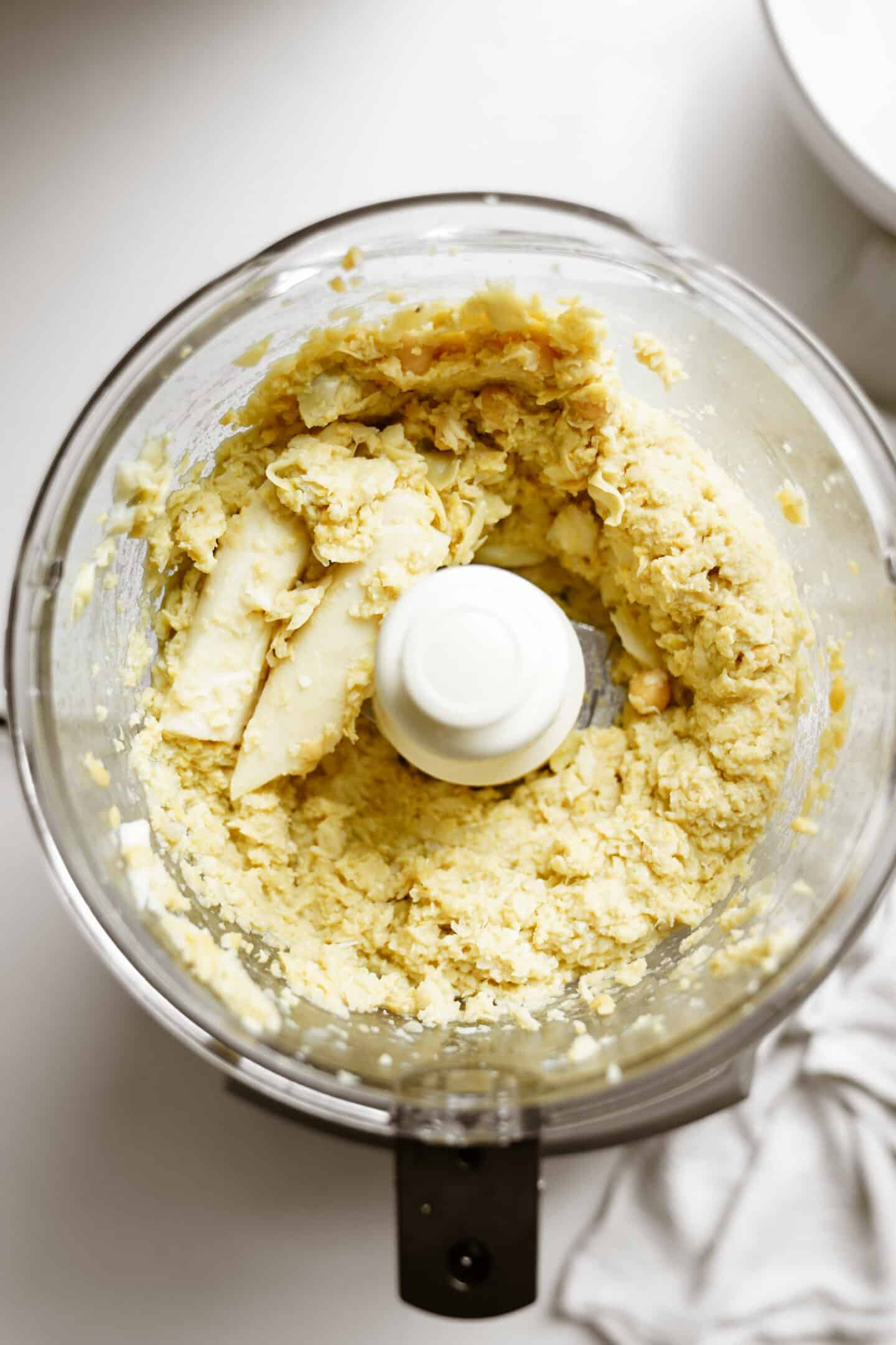 Ingredients in food processor for vegan crab cakes