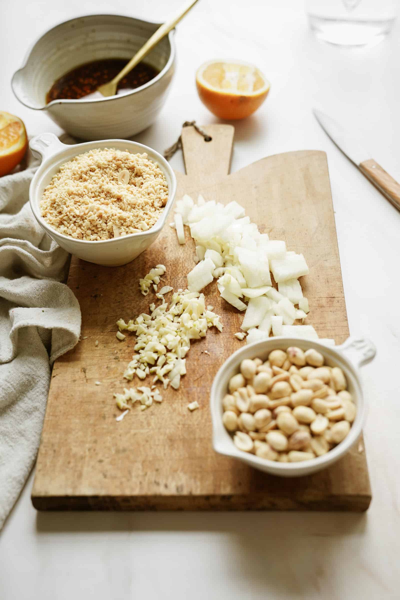 Ingredients for lentil meatballs on cutting board