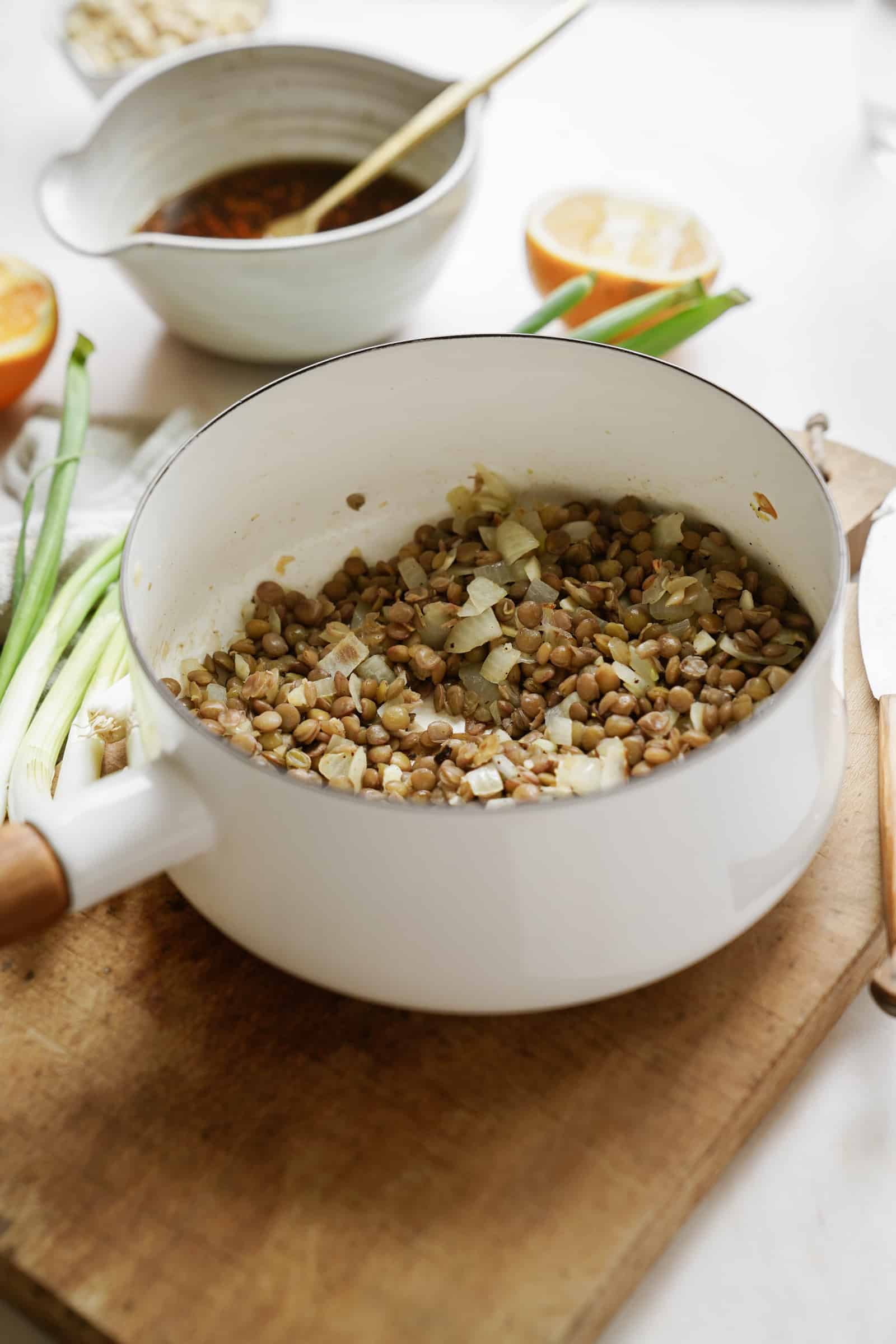 Ingredients for lentil meatballs in a pot