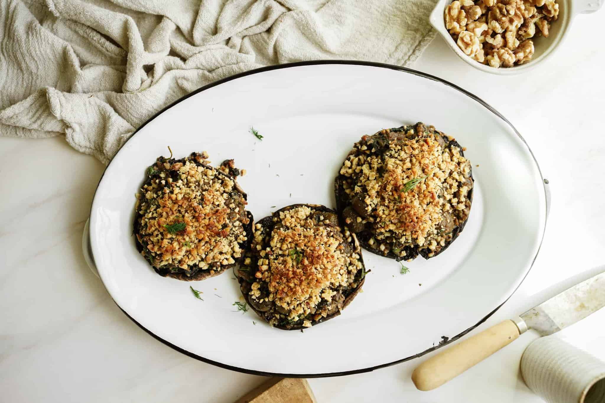 Vegan Stuffed Portobello Mushrooms on a serving plate