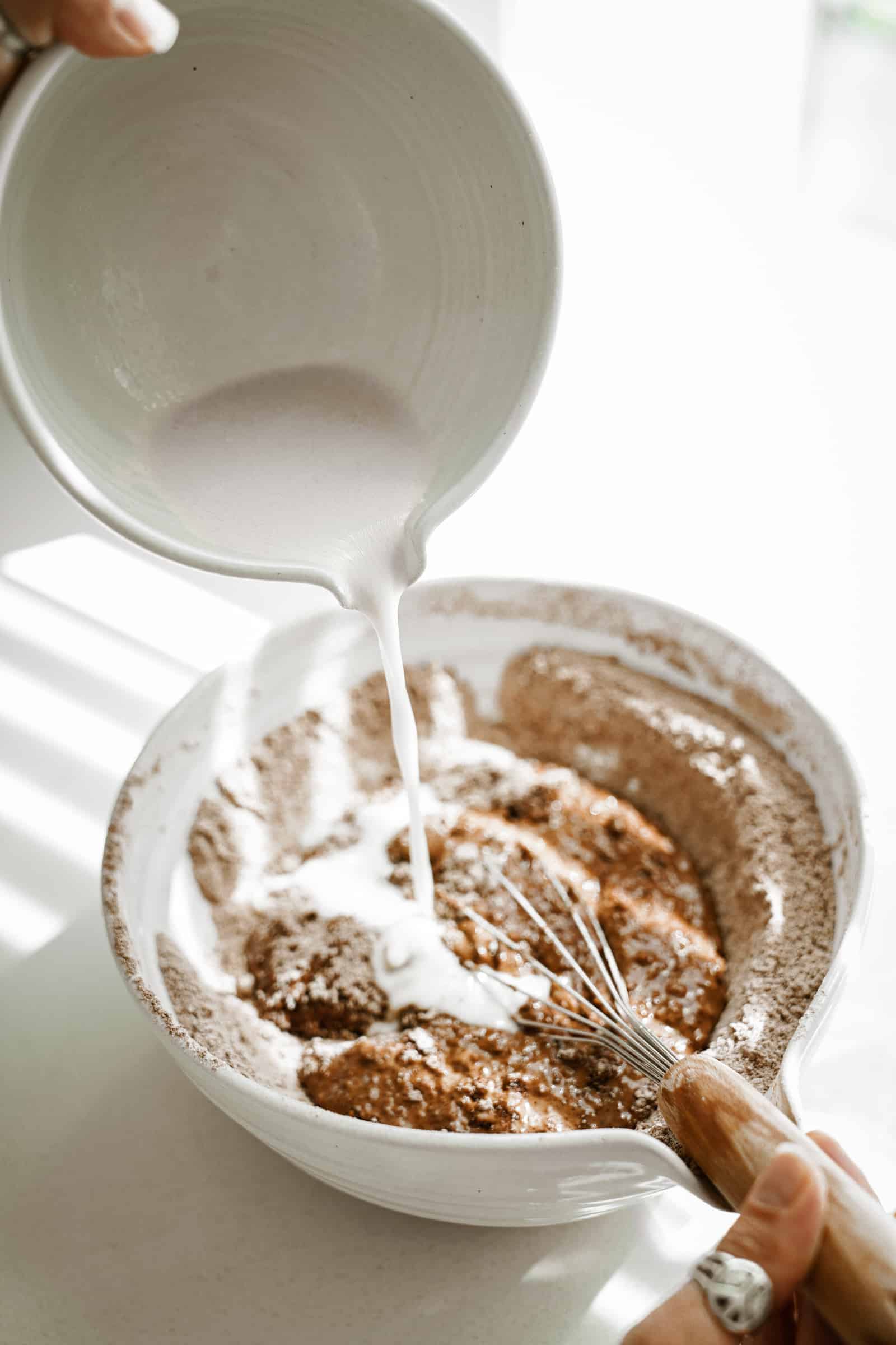 Wet ingredients being added to dry