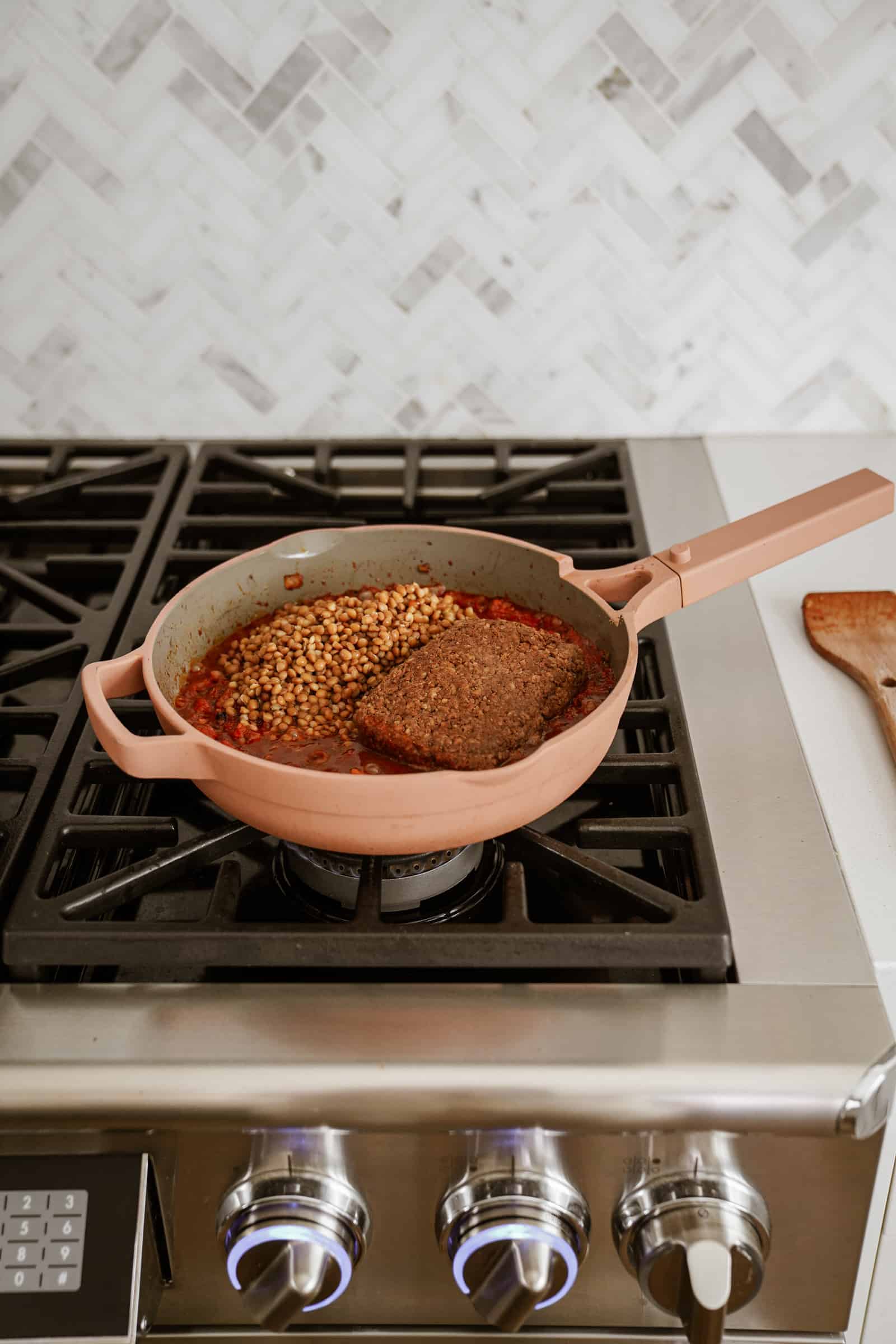 Ingredients being added to pot for shepherd's pie