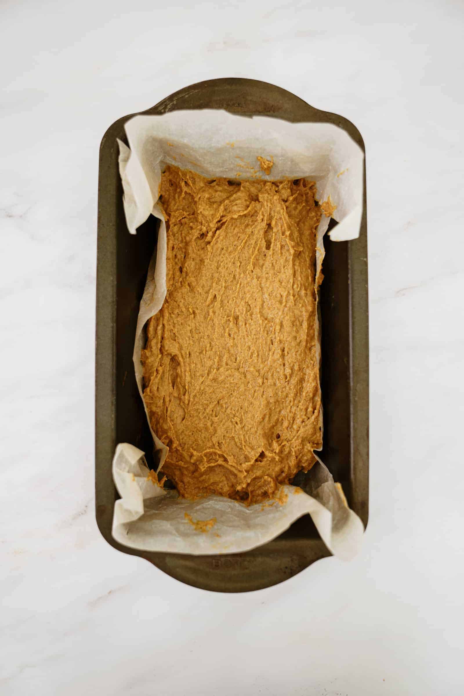 Pumpkin bread batter in a baking tin