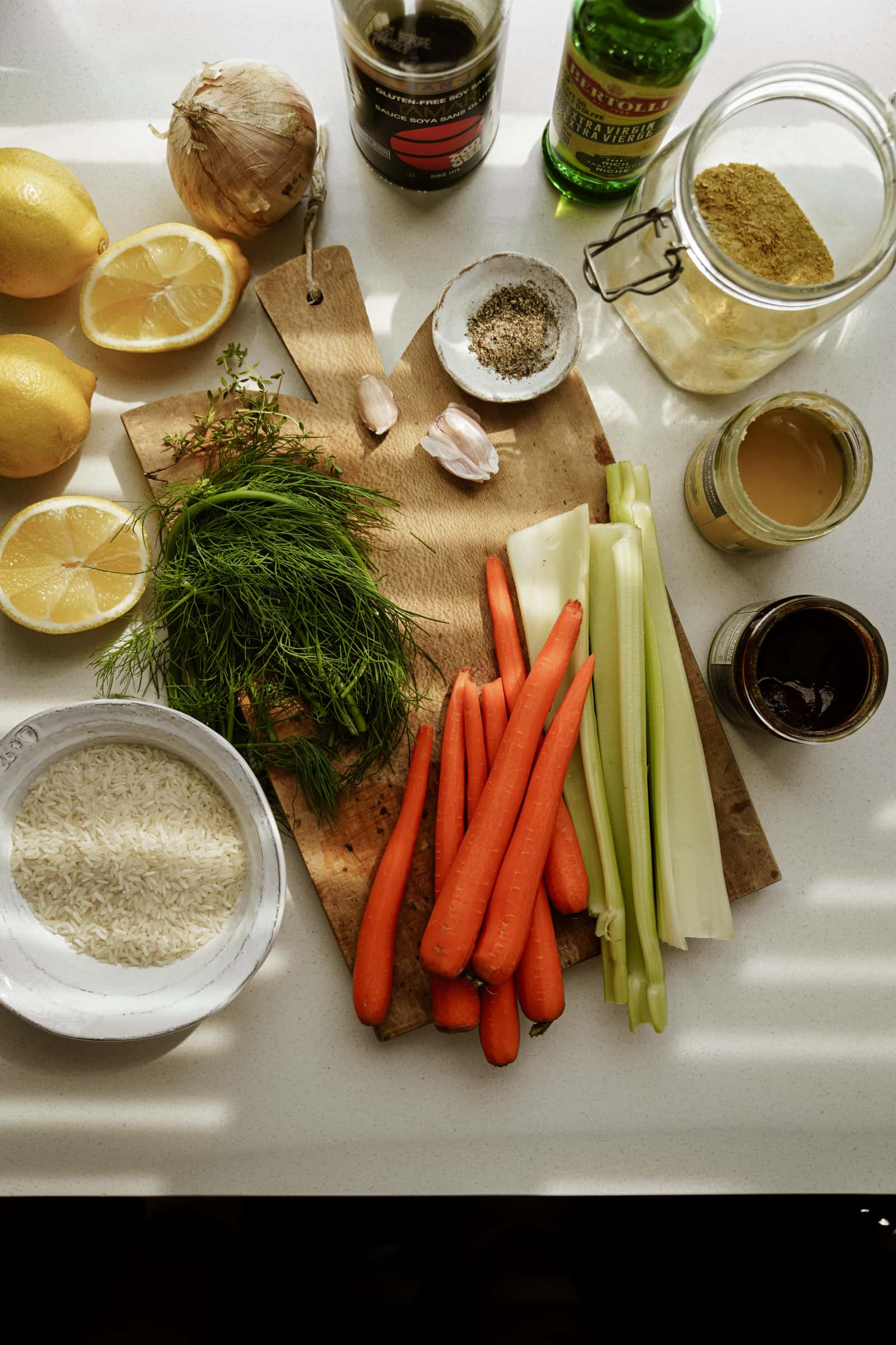 Ingredients for lemon rice soup on counter