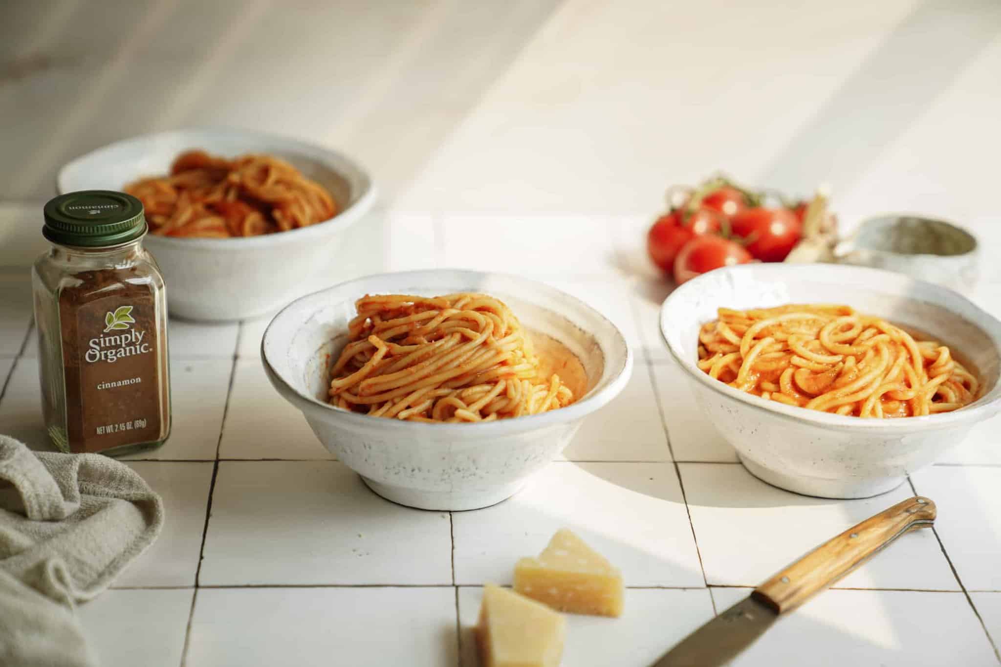 Bowls of spaghetti on a counter