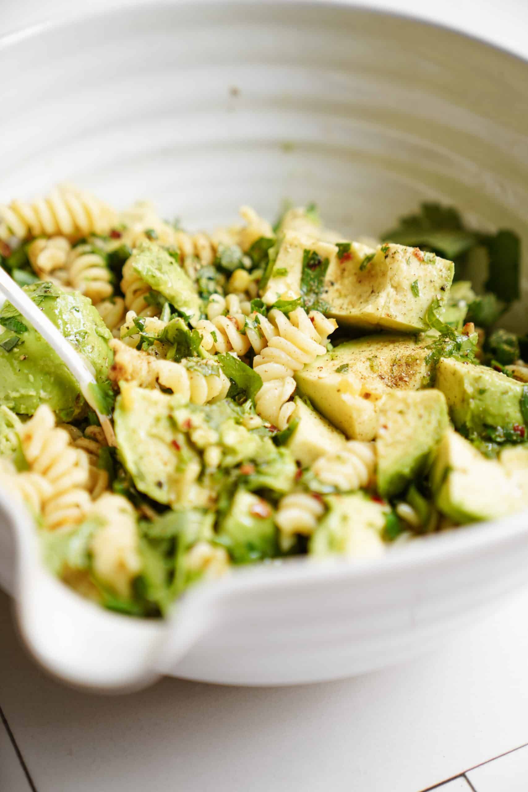 avocado pasta salad close-up in bowl