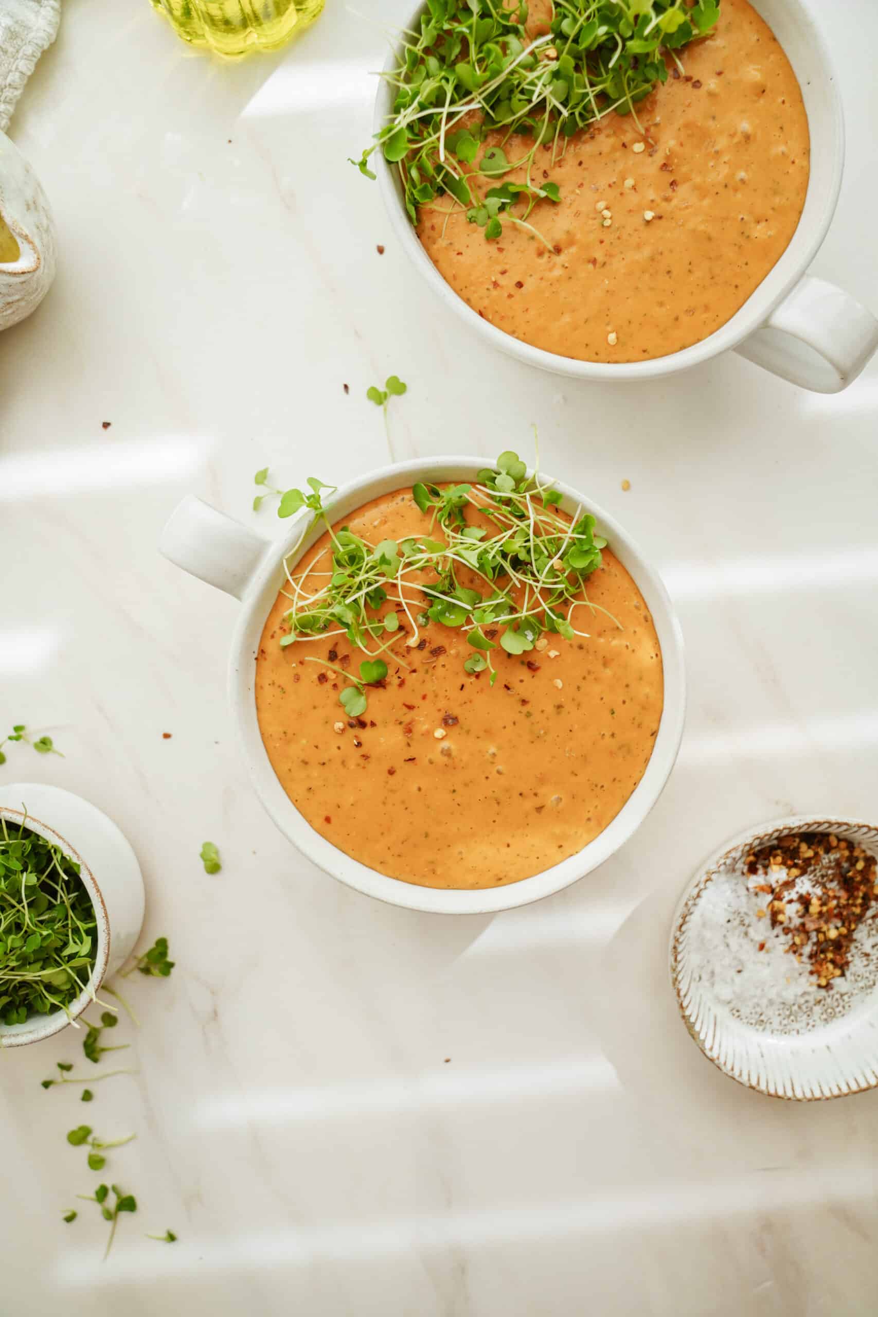 Creamy tomato soup in a white bowl