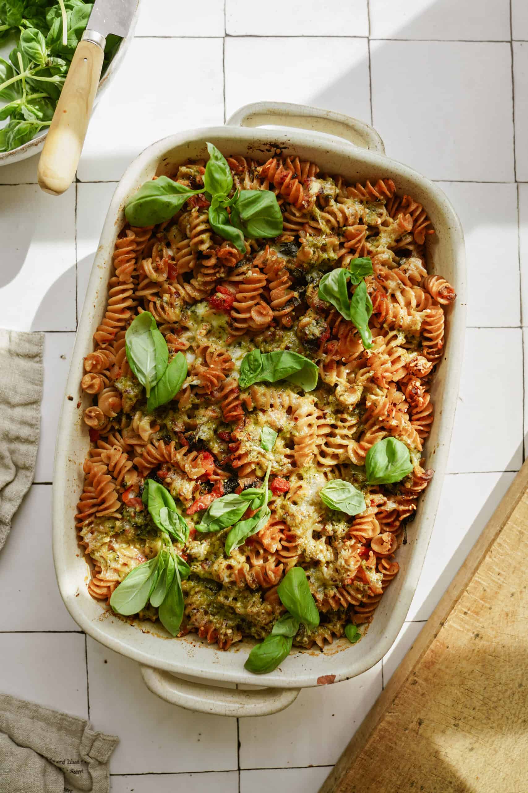 Pesto pasta bake in a casserole dish