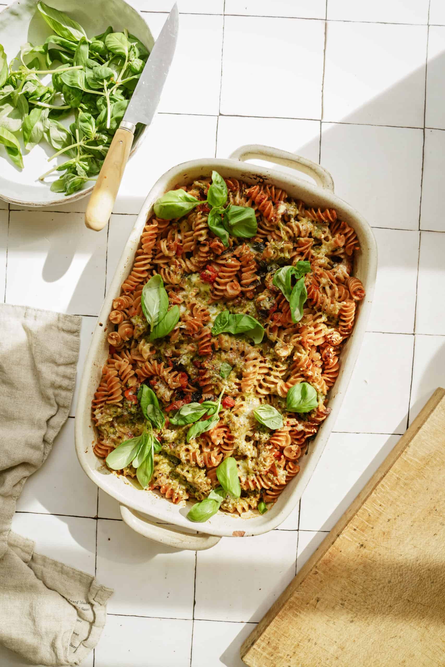 Pesto pasta bake in a casserole dish