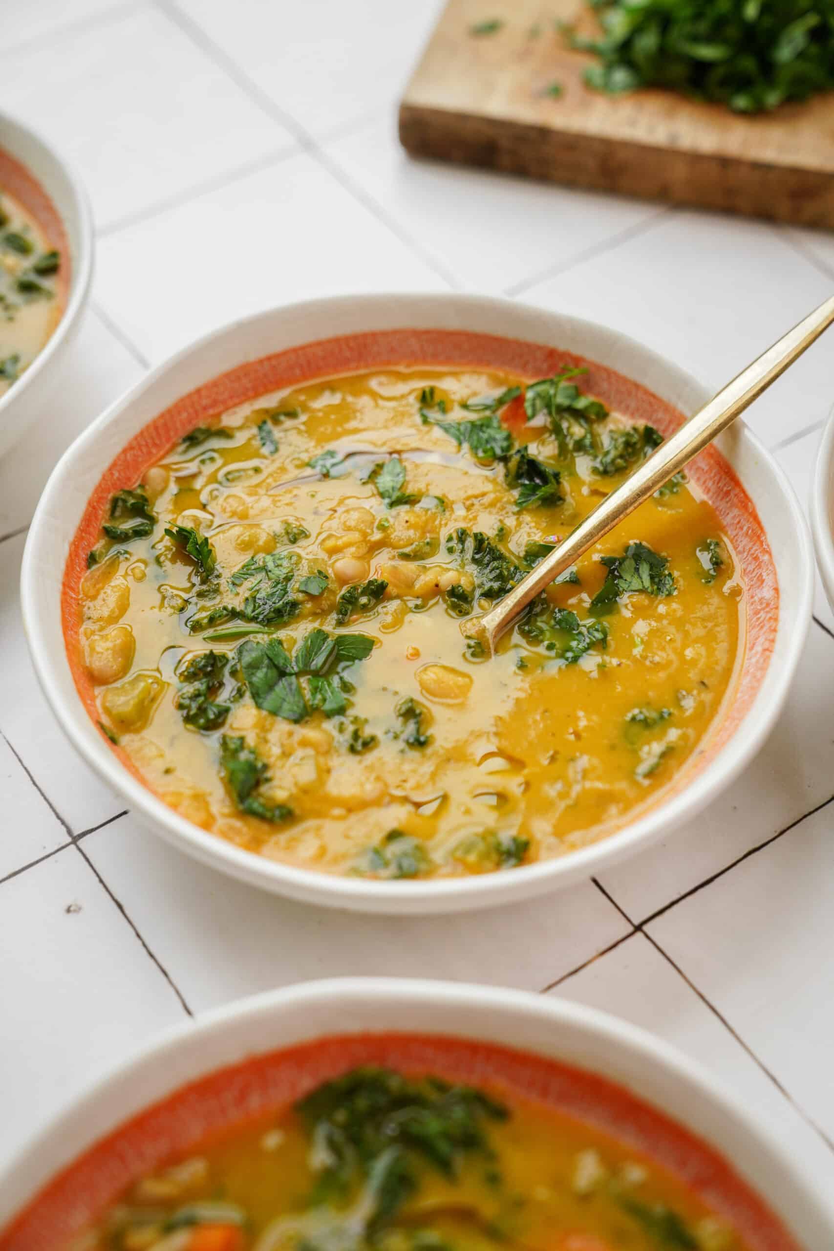 White bean soup in a white bowl