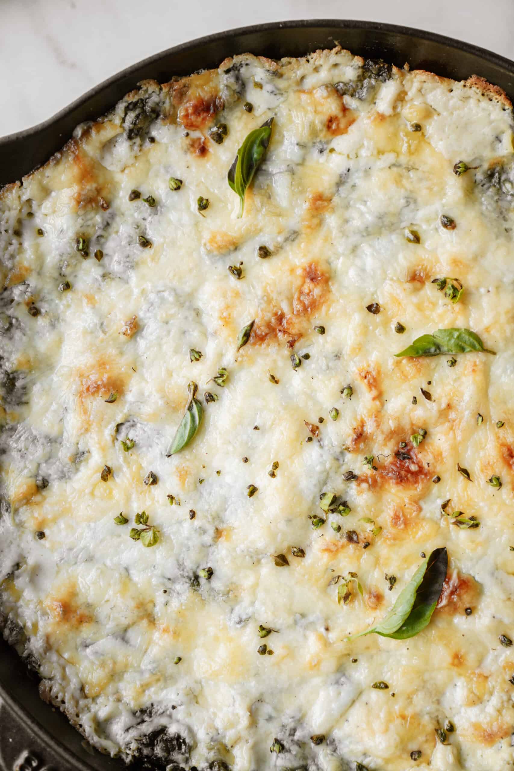 Spinach and Artichoke Dip in cast iron dish