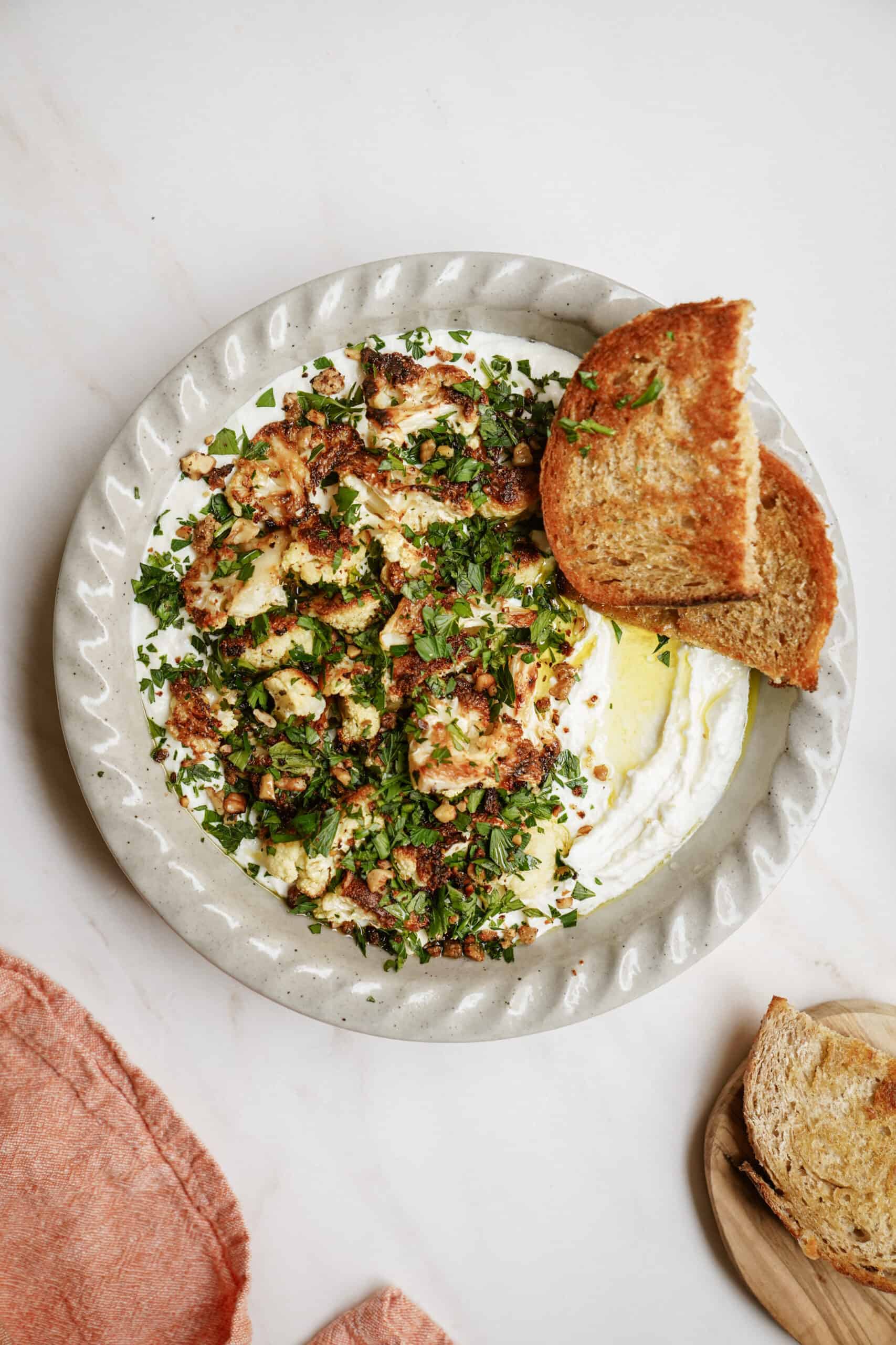 Whipped feta dip with pita chips on the side