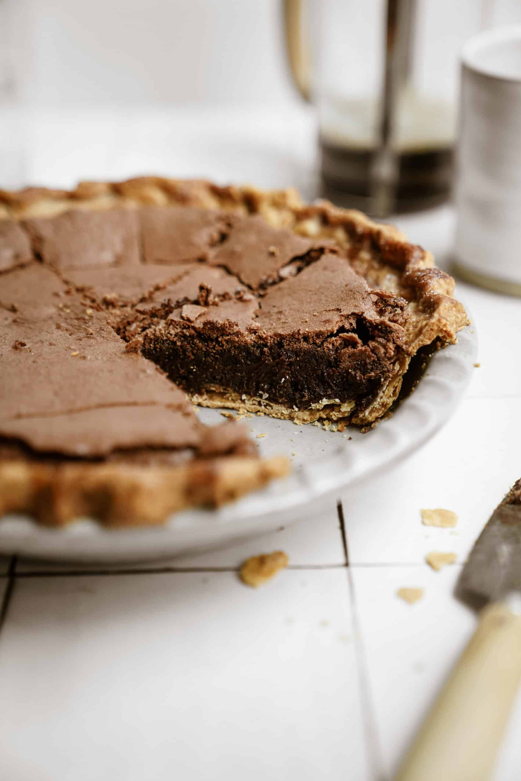 Brownie pie up close with a slice out of it