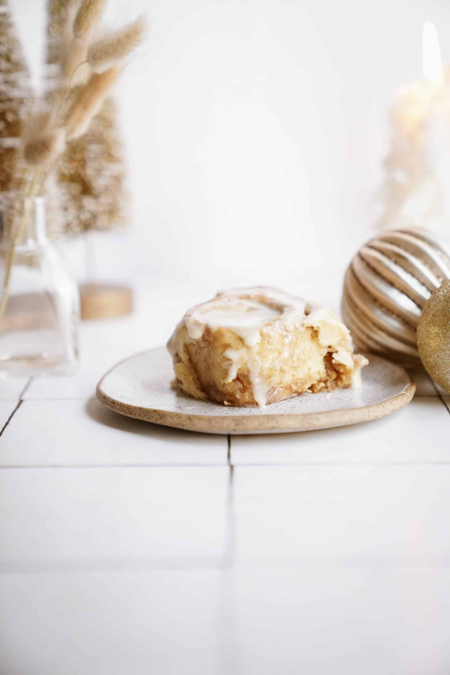 Eggnog cinnamon roll on a plate