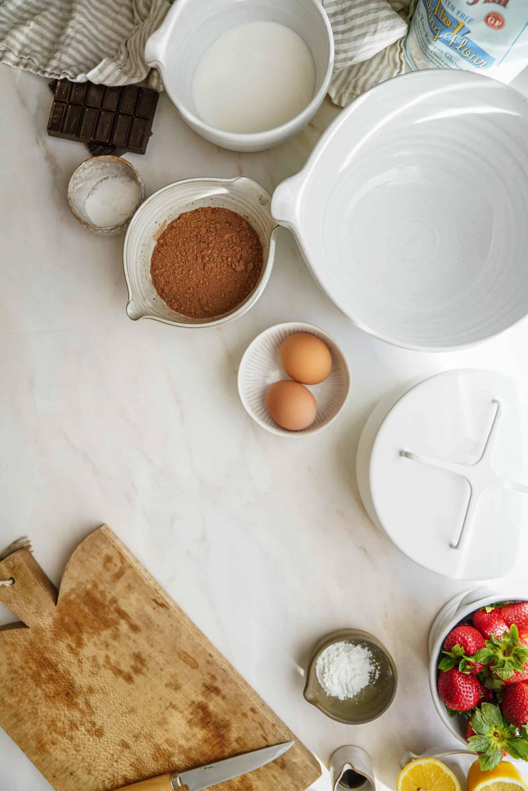 Ingredients for chocolate cupcakes on counter