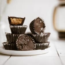 Homemade Peanut Butter Cups stacked on a plate