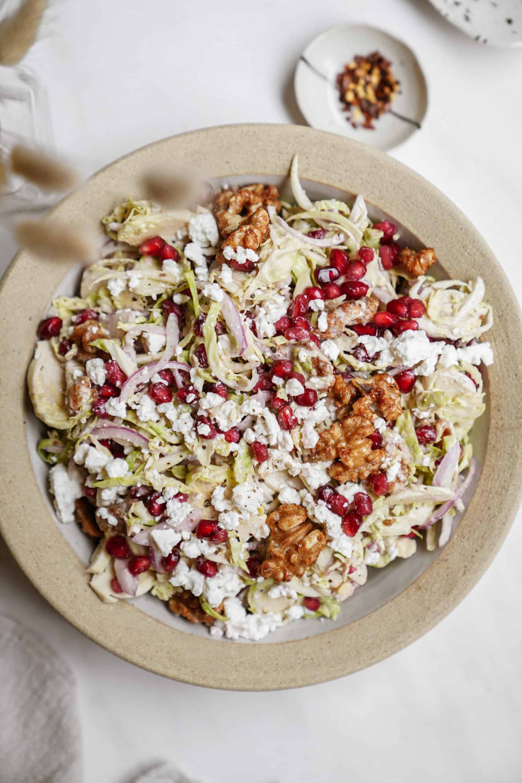 Shaved Brussel Sprout Salad in a big white bowl