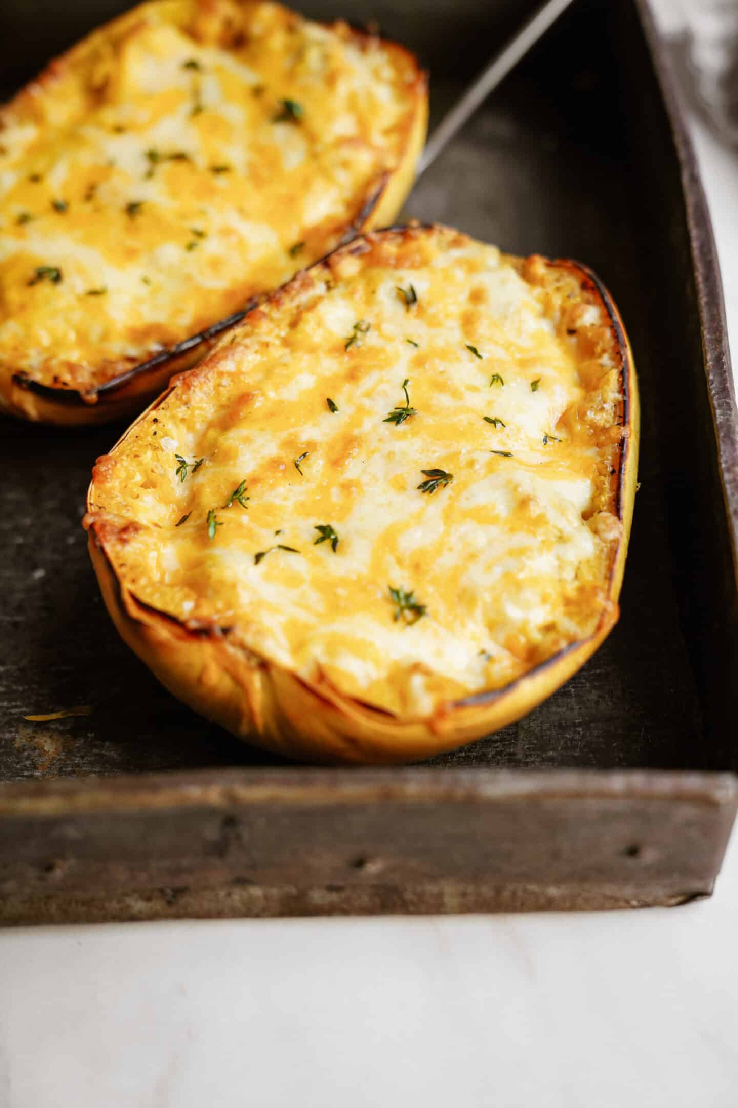 Stuffed spaghetti squash with cheese on top