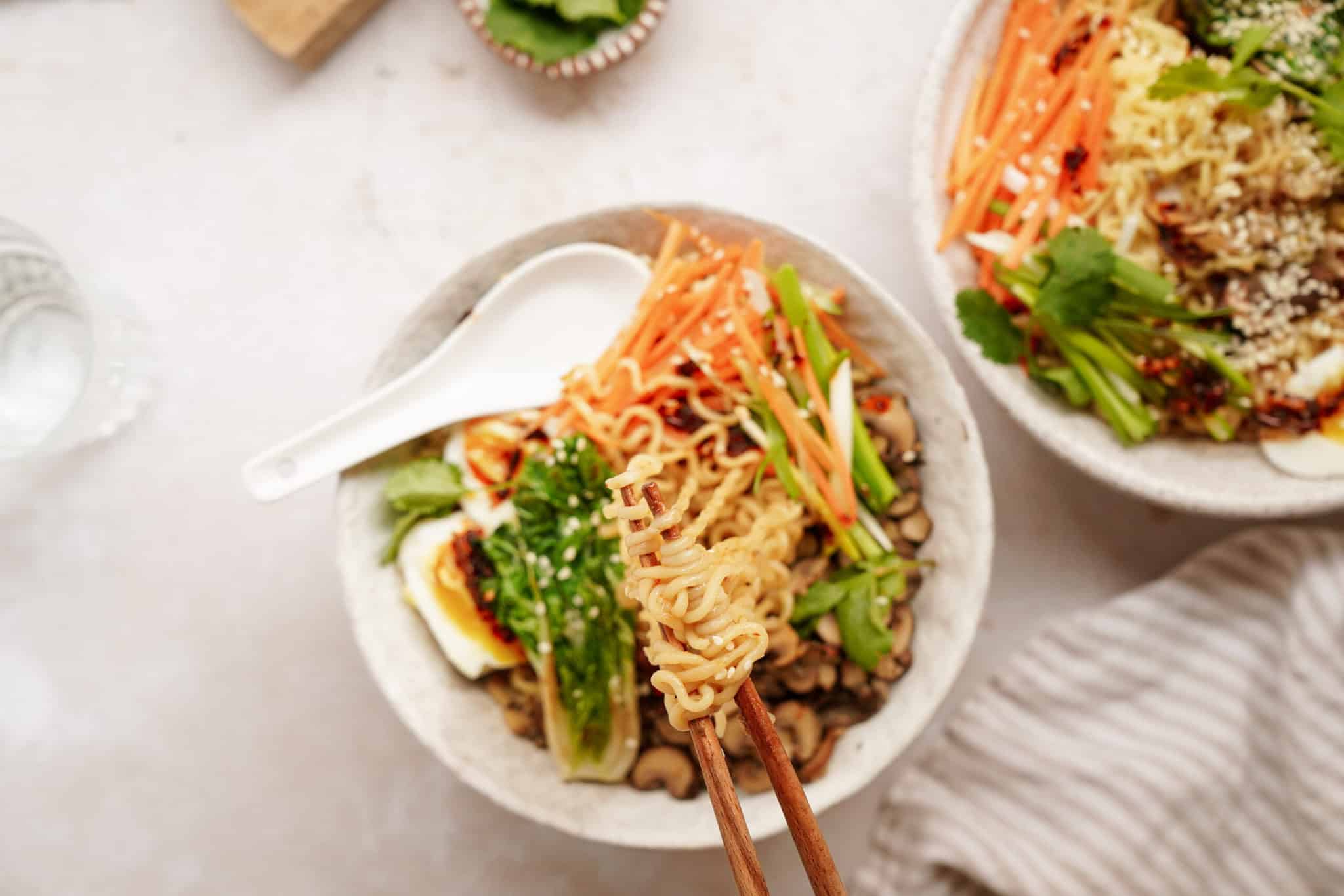 Mushroom ramen in bowls on counter