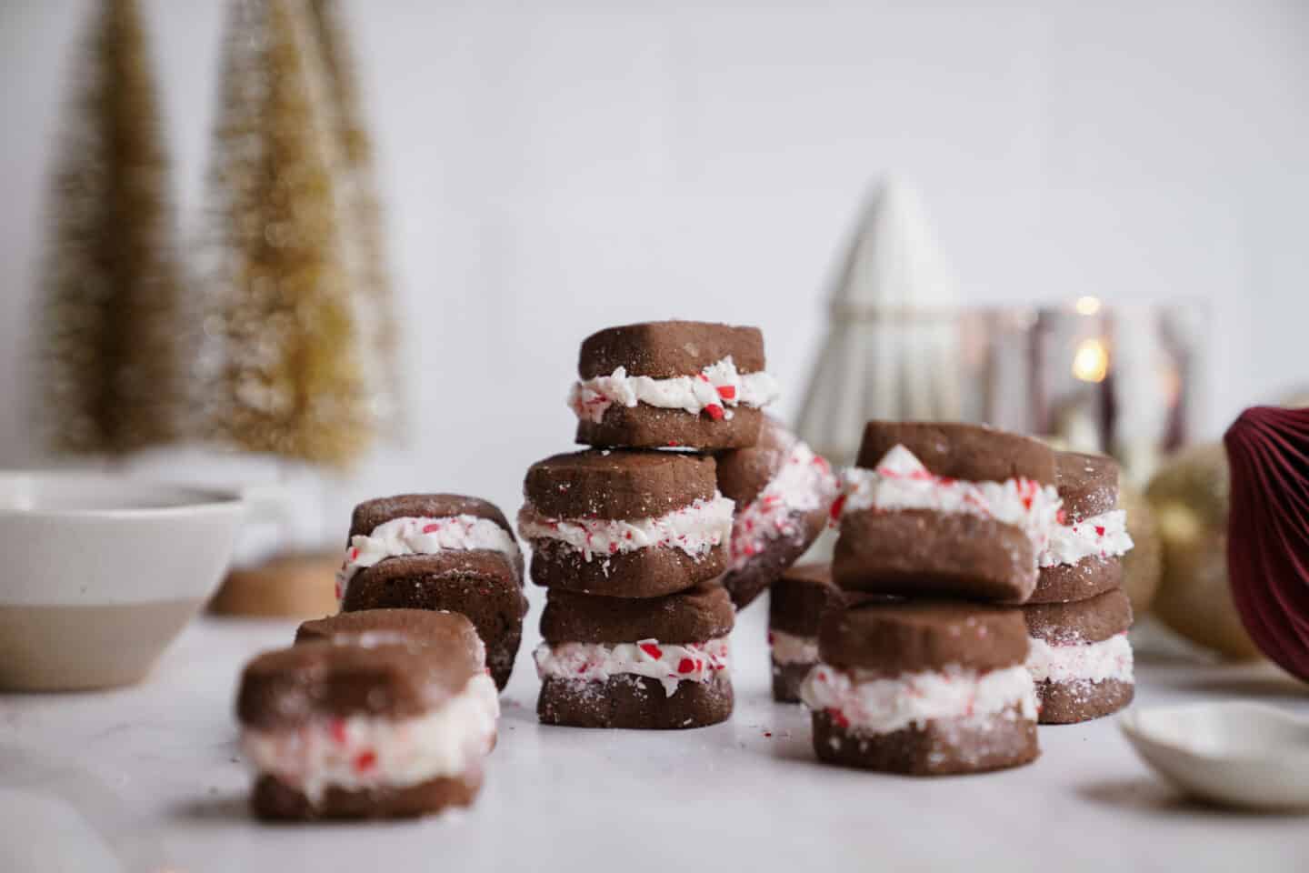 sandwich cookies stacked on a tabletop